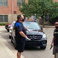 Dr. Huizen greets family members